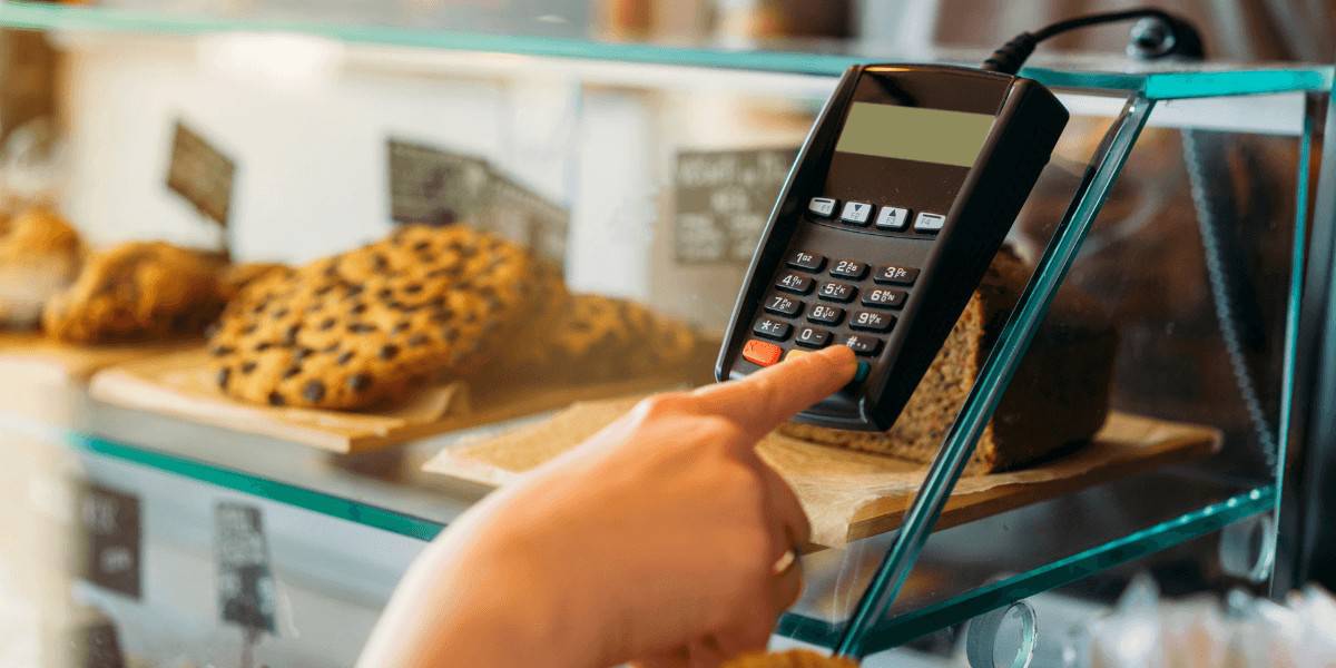 small business payment method debit credit card pinned closeup 